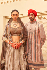 Exclusively for couple combo Light brown designer outfit in pure pv silk and foil print with detailed hand mirrorwork